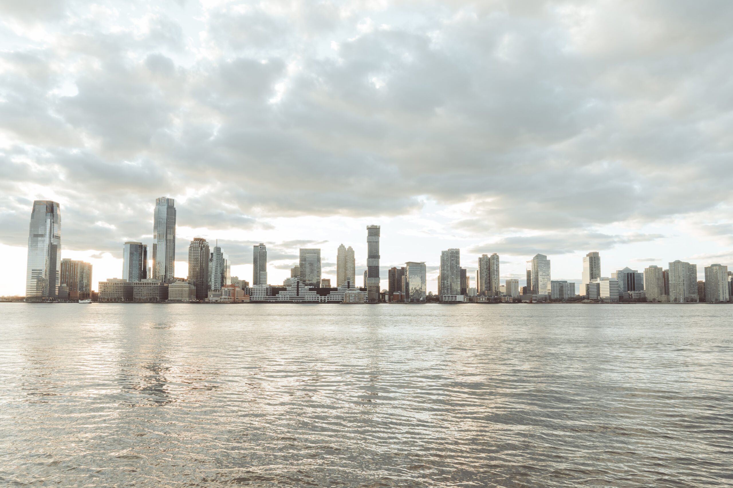 jersey city new jersey skyline from new york; wall street;